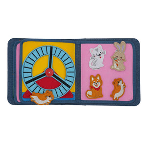 Two pages of My First Book Princess busy book product photo, showing the cute characters and sensory interactive play in this Montessori inspired book. Makes a great baby gift.