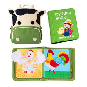 My First Book Busy Farm busy book product photo showing the Montessori inspired book both open and closed, as well as the included backpack. Makes a great baby gift.