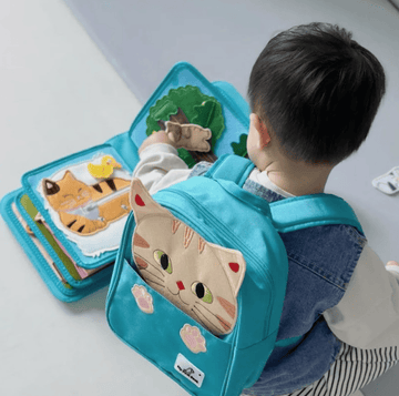 How Do You Create Busy Book Activities That Help Toddlers Navigate Daily Transitions Without Meltdowns?