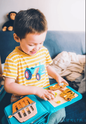 How Can 'Travel Calm Busy Books' Reduce Motion Sickness and Travel Anxiety in Young Children?