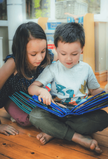 How Do You Design 'Money Smart Busy Books' That Teach Financial Literacy Through Play?