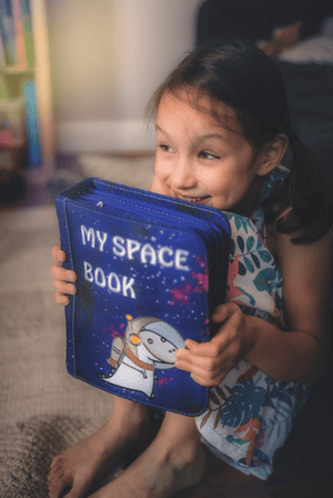 What Are 'Space Adventure Busy Books' That Spark Astronomy Interest and Wonder?