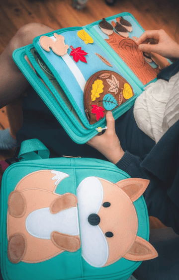 How Can 'Train Station Busy Books' Explore Transportation and Community Connection?