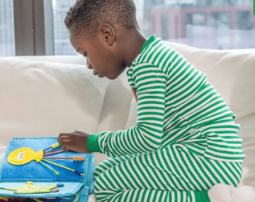 The Psychology of Busy Books: How Fabric Books Support Mental Health