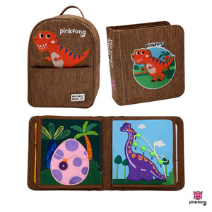 My First Book Dinosaur busy book product shot, showing the Montessori inspired, sensory busy book, waterproof backpack and packaging that makes a perfect baby gift. 