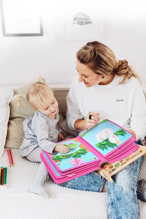 Mom and daughter play with My First Book Princess busy book, happily exploring all the Montessori inspired sensory features. Makes a great baby gift.