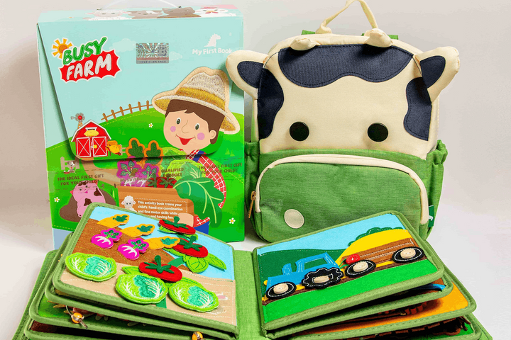 MyFirstBook busy farm fabric book with cow-shaped bag, interactive activity pages featuring vegetables and tractors