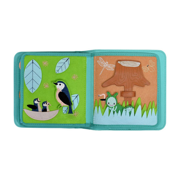 A product photo featuring two pages of the My First Book Nordic Forest busy book, showcasing charming bird and insect characters along with interactive sensory activities in a Montessori-inspired layout. An ideal baby gift
