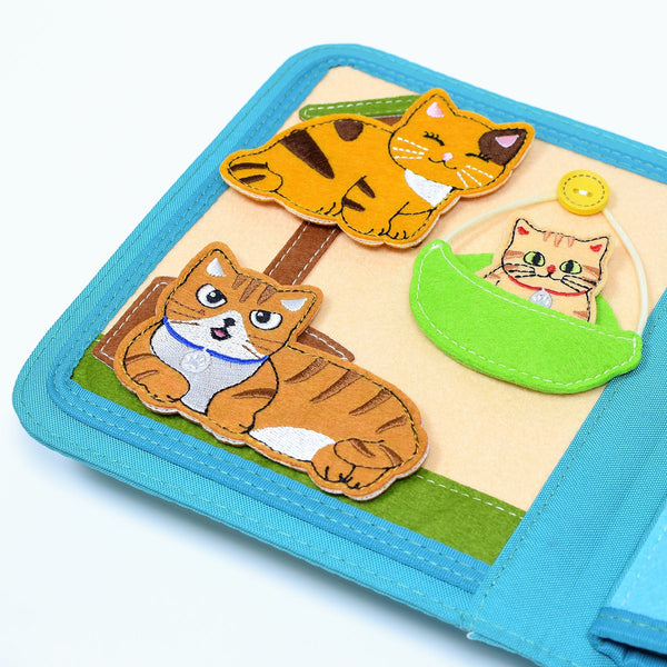 A picture showcasing 3 cats on a cat house. Makes great baby gift.