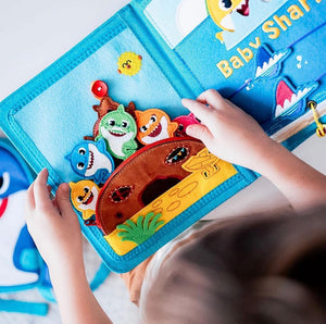 75+ interactive and sensory features inspired by Montessori play in the busy book, including the whole Baby Shark family. Makes a great baby gift. 