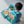 Baby playing with My First Book Lucky Cat busy book with the cat backpack on, engaged in the Montessori inspired play and sensory activities. Makes a great baby gift.
