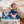 A young boy shows off his Baby Shark backpack, included with the busy book. Makes a great baby gift. 