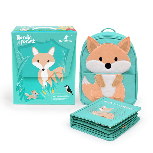 A photo displaying everything included with the My First Book Nordic Forest set: gift-ready packaging, a Montessori-inspired sensory busy book, and a high-quality, waterproof fox backpack—perfect for a memorable baby gift.