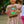 This picture shows a girl being gifted the Dinosaur busy book. The book makes great baby gift.